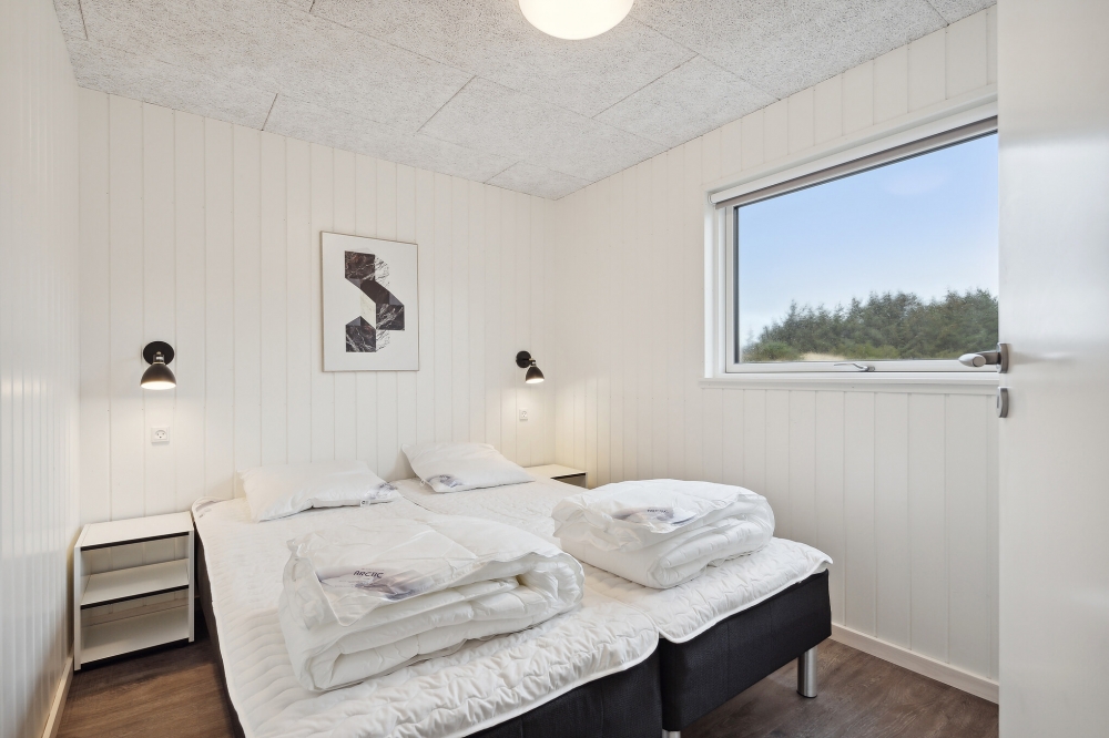 Ett av de 6 utmärkta sovrummen i lyxstuga nr 765 i Tyskland.