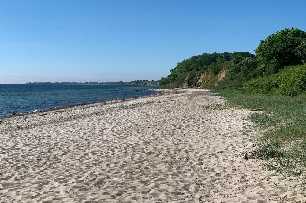 Stranden i närheten av lyxhus 657 i Sydjylland bjuder in till en promenad.