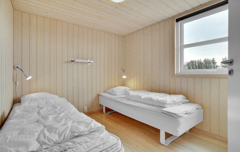 Ett av de 8 utmärkta sovrummen i lyxstuga nr 194 i Nordjylland.