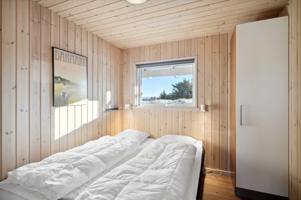 Ett av de 9 utmärkta sovrummen i lyxstuga nr 176 i Vestjylland.