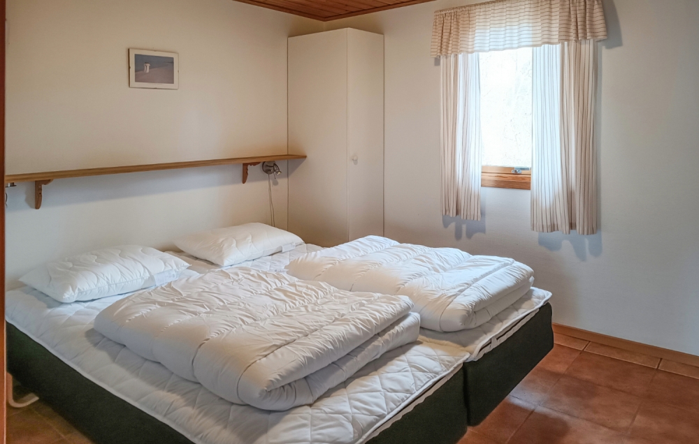 Ett av de 3 utmärkta sovrummen i lyxstuga nr 126 i Sverige.