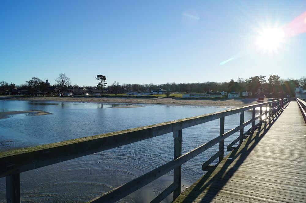 Stranden i närheten av lyxhus 127.