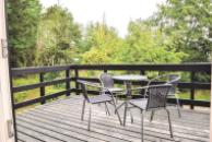Njut av en grillkväll på terrassen i lyxstuga nr 199 i Vestjylland